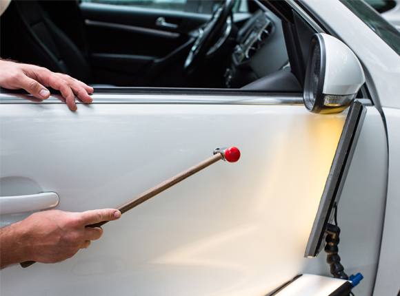 mobile dent repair for a concierge car in Dallas